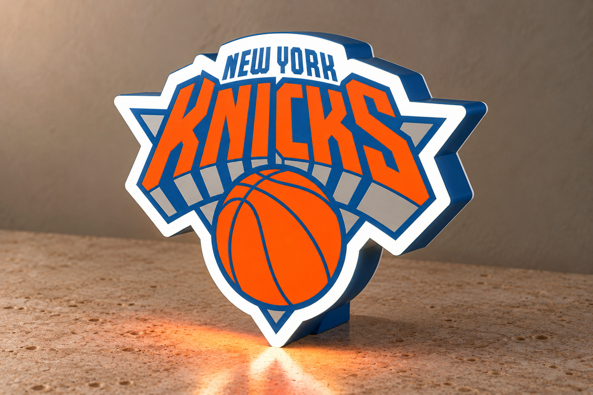 New York Knicks basketball logo LED lightbox side-angle showing blue housing