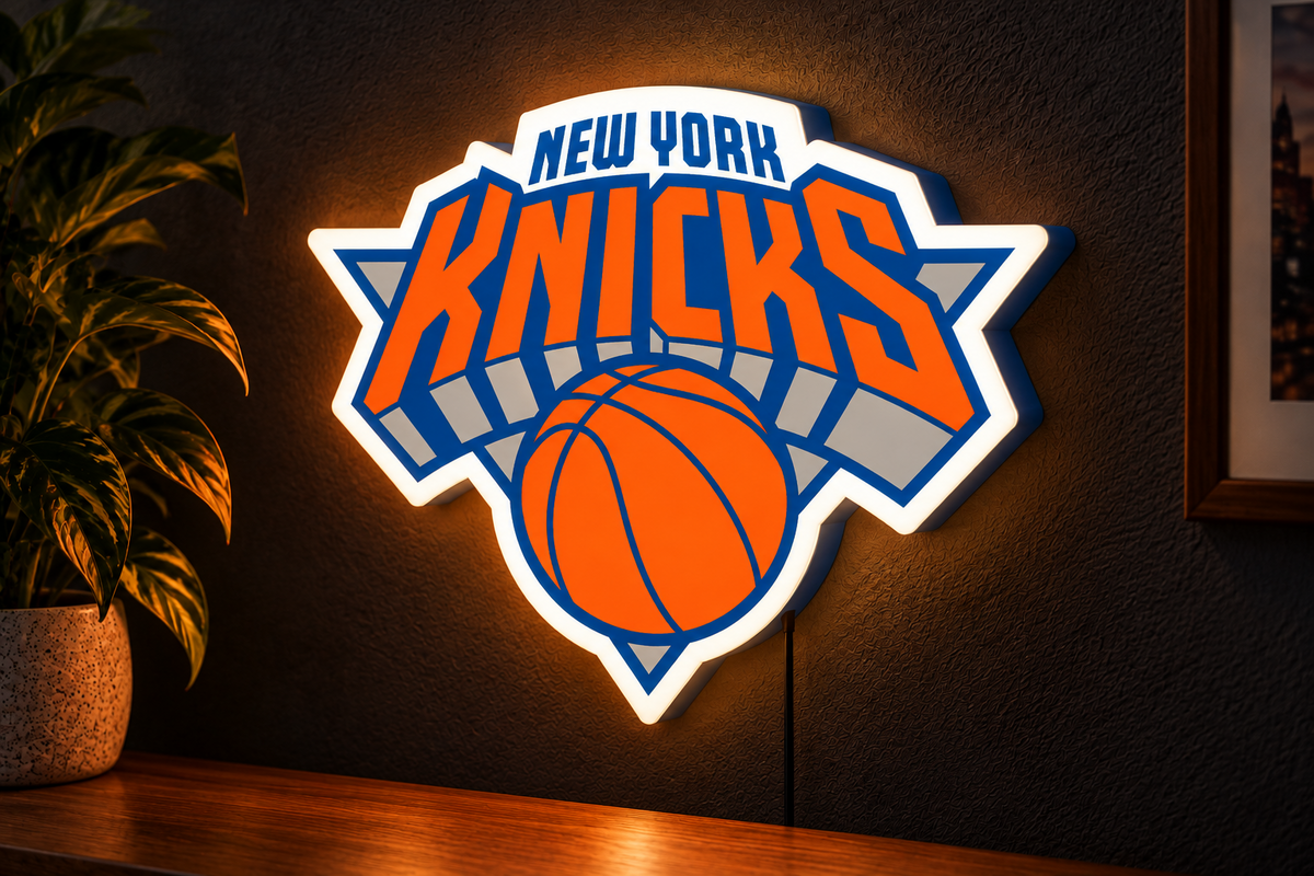 New York Knicks illuminated LED wall sign mounted on dark wall