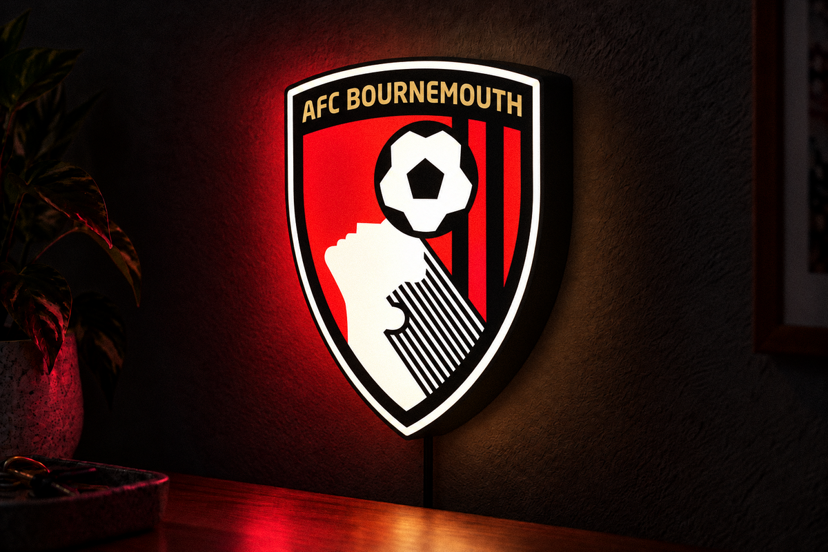 AFC Bournemouth shield crest LED lightbox illuminated on a black wall