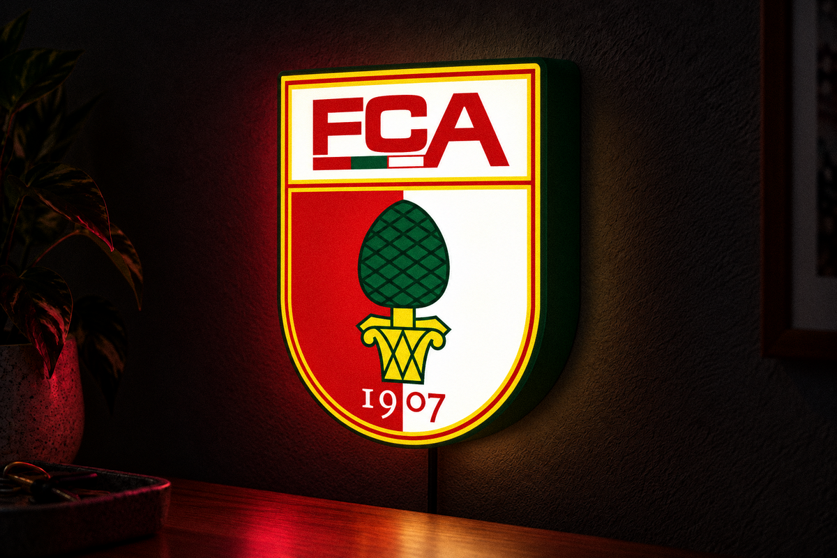 FC Augsburg crest LED lightbox glowing on a dark wall