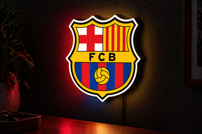 FC Barcelona illuminated shield crest LED lightbox displayed on a dark wall