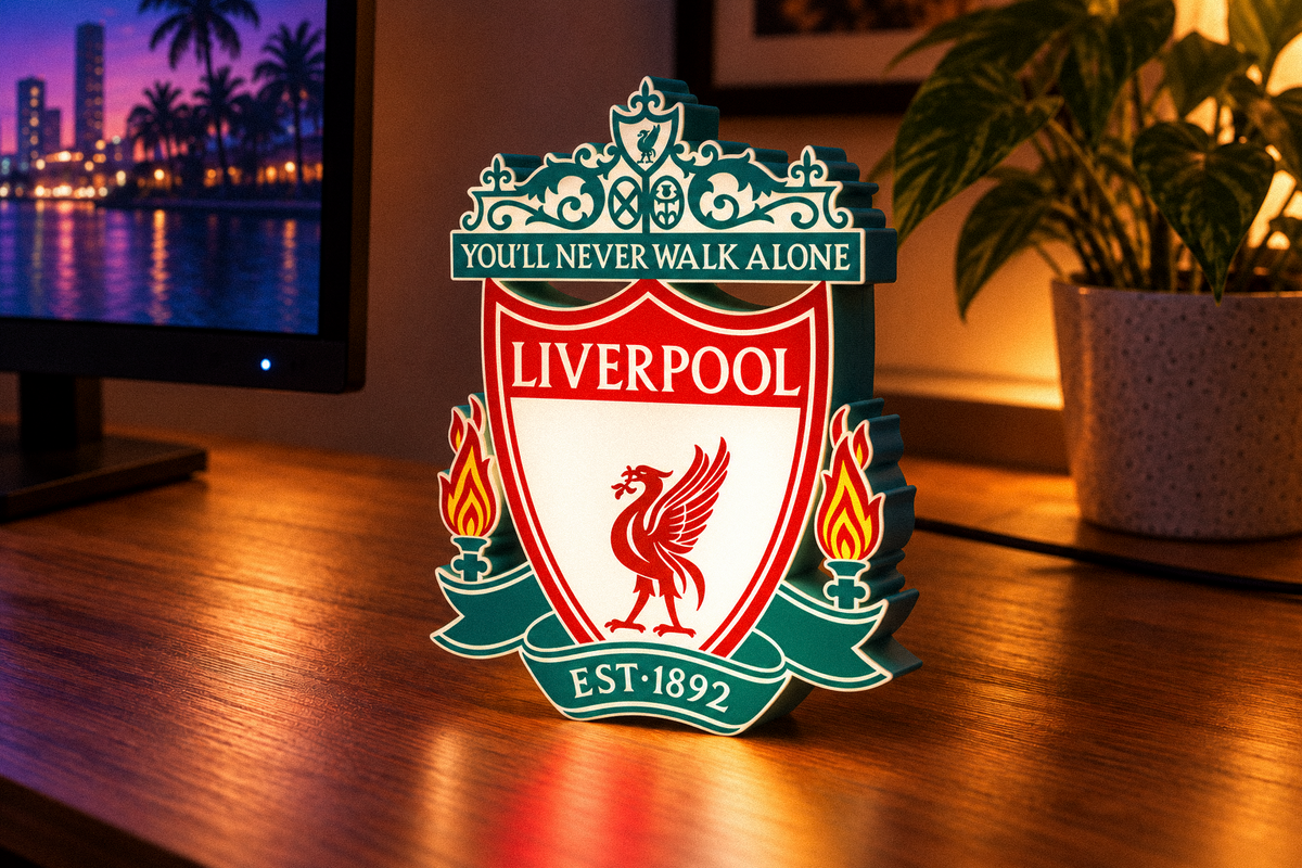 Liverpool FC LED crest lightbox displayed on wooden desk