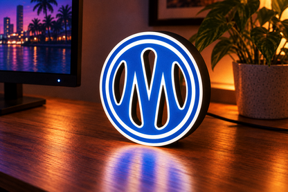 Olympique de Marseille round blue-and-white illuminated lightbox displayed on desk
