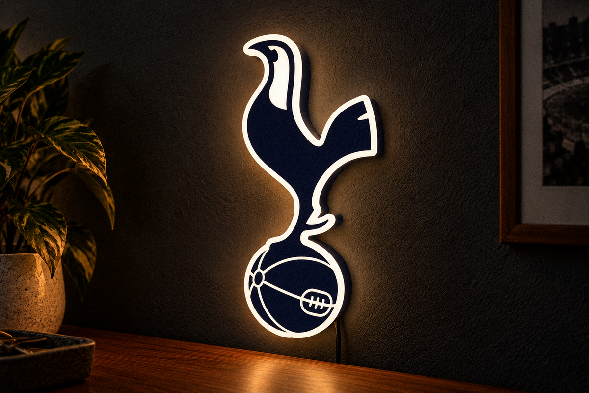 Tottenham Hotspur navy cockerel-shaped LED football lightbox illuminated on dark wall