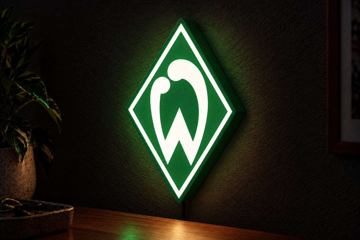 Werder Bremen green and white LED lightbox mounted on a dark wall