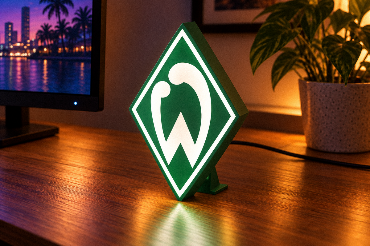 Werder Bremen illuminated LED crest lightbox displayed on a wooden desk